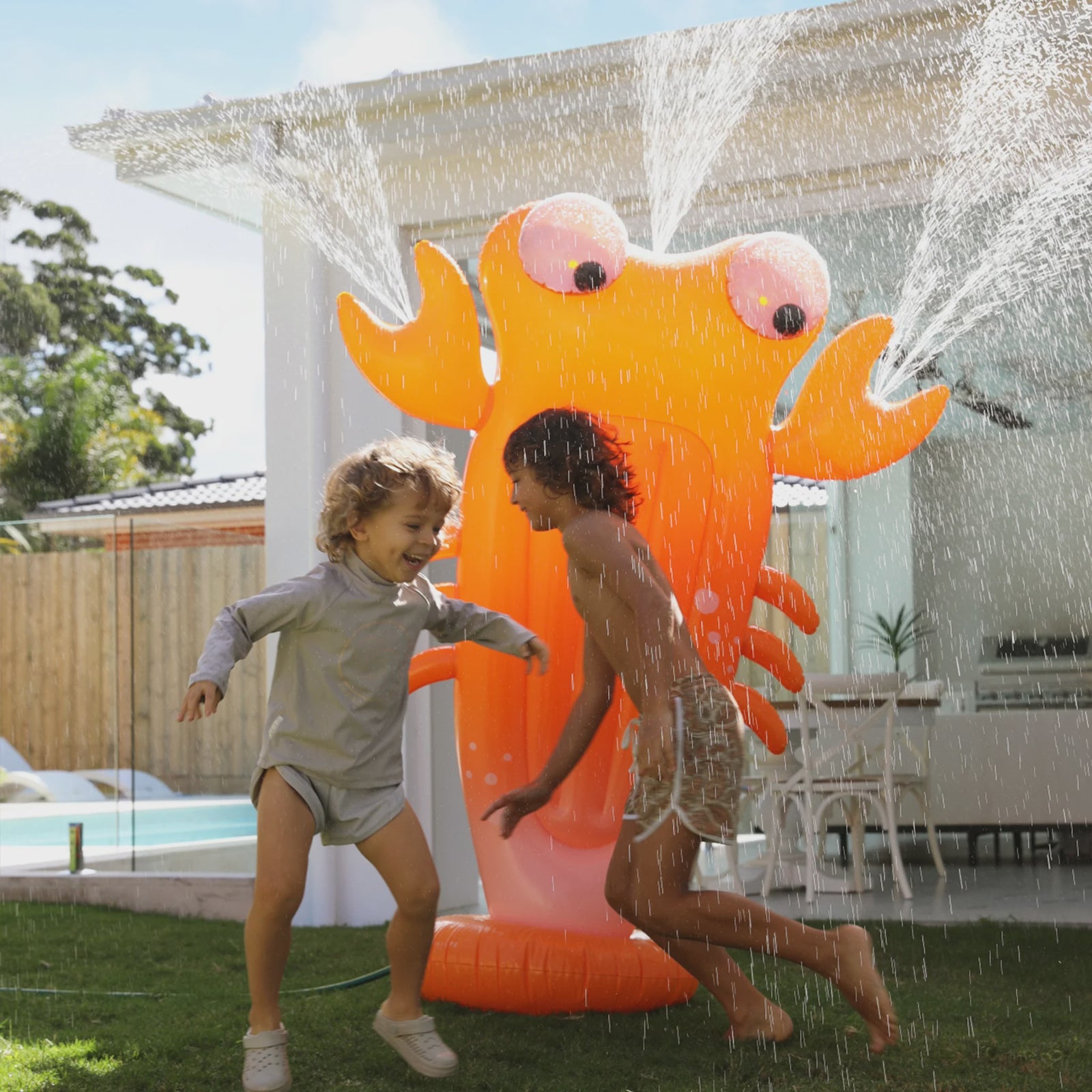 Inflatable Giant Sprinkler - Sonny the Sea Creature Neon Orange